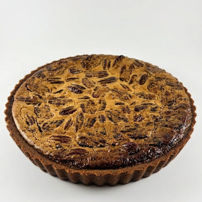 Pecan Billionaire tart, whole, topped with glazed pecans